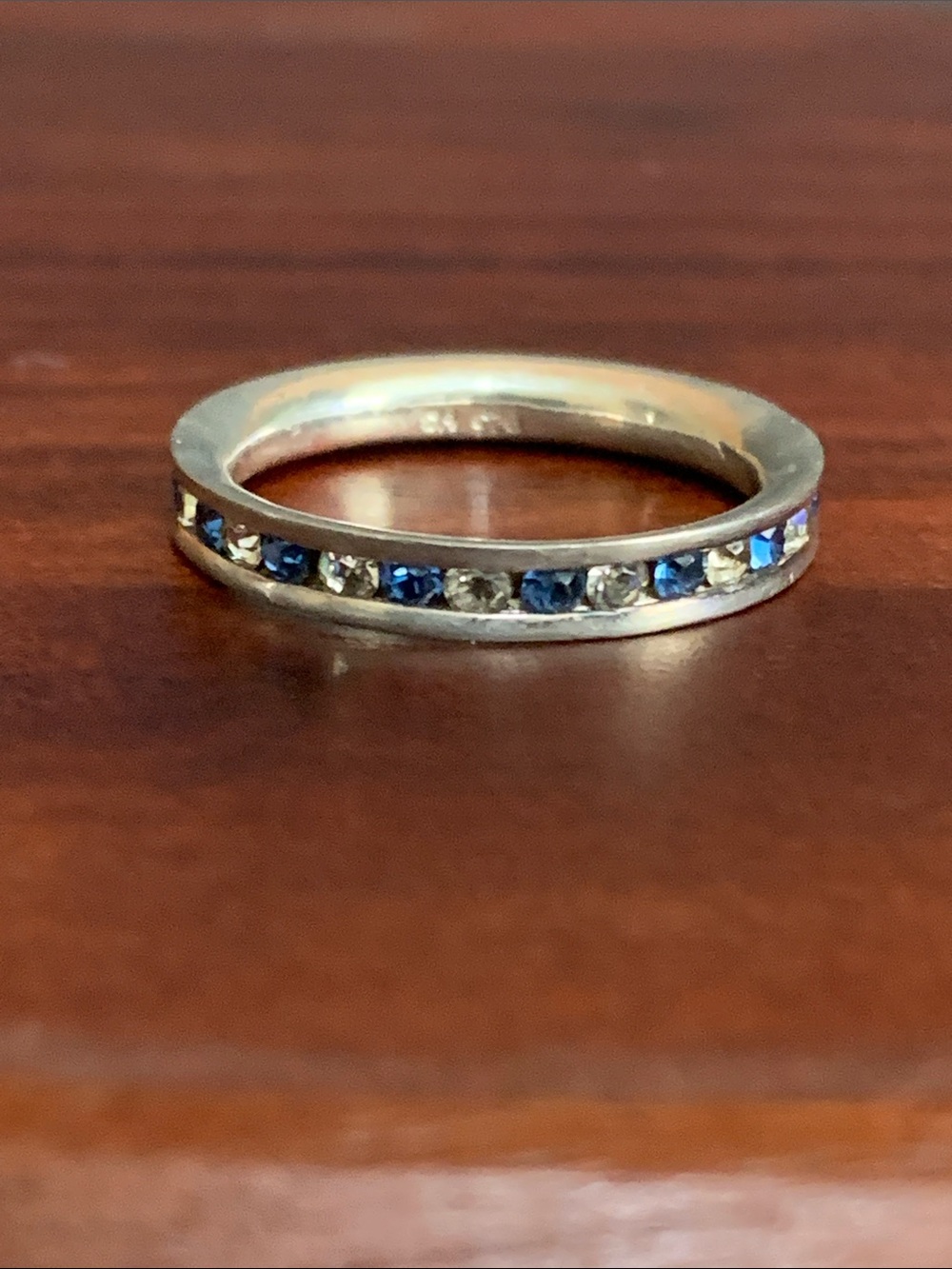 925 plated ring with blue and clear stones size 7